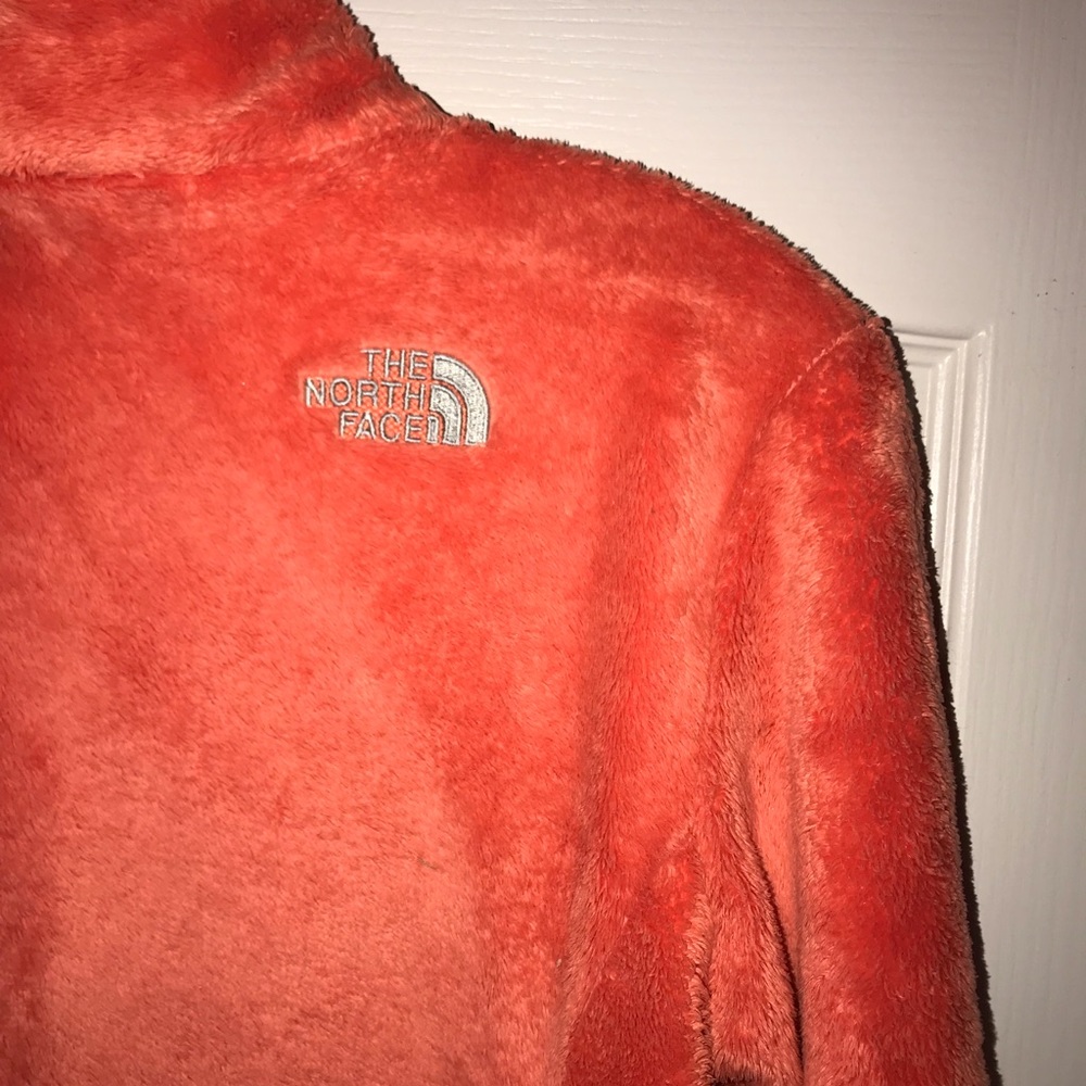 Orange fleece North Face jacket
